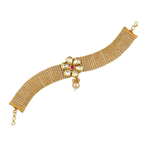 gold bracelet with kundan and kempu stones